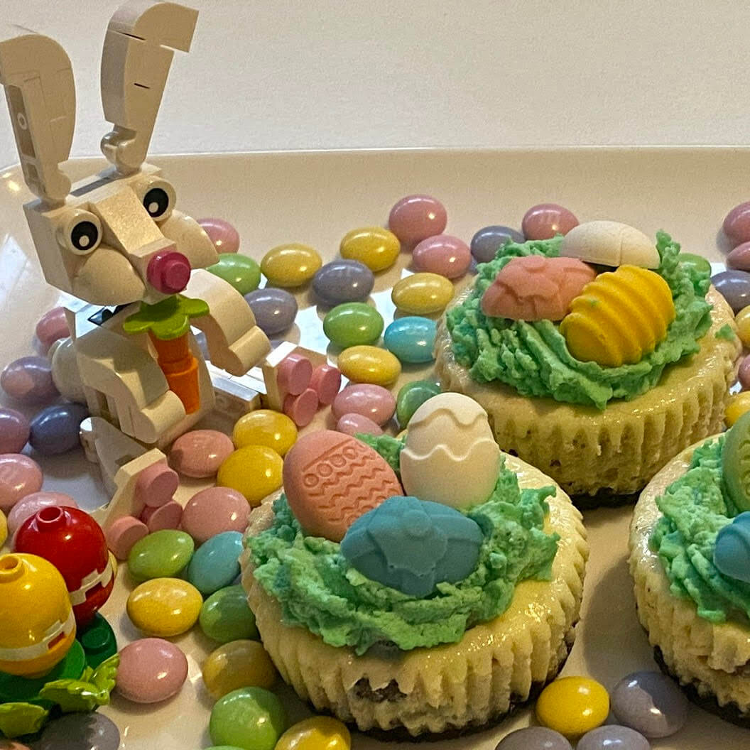 "Egg"-cellent Easter This special limited time Easter themed cheesecake starts out with an Oreo crust. The vanilla cheesecake layer is filled with festive pastel colored Easter M&Ms. To top it off, colorful candy eggs sit in a "nest" of whipped cream. This cheesecake is sure to make an "egg"-cellent addition to your Easter celebration.