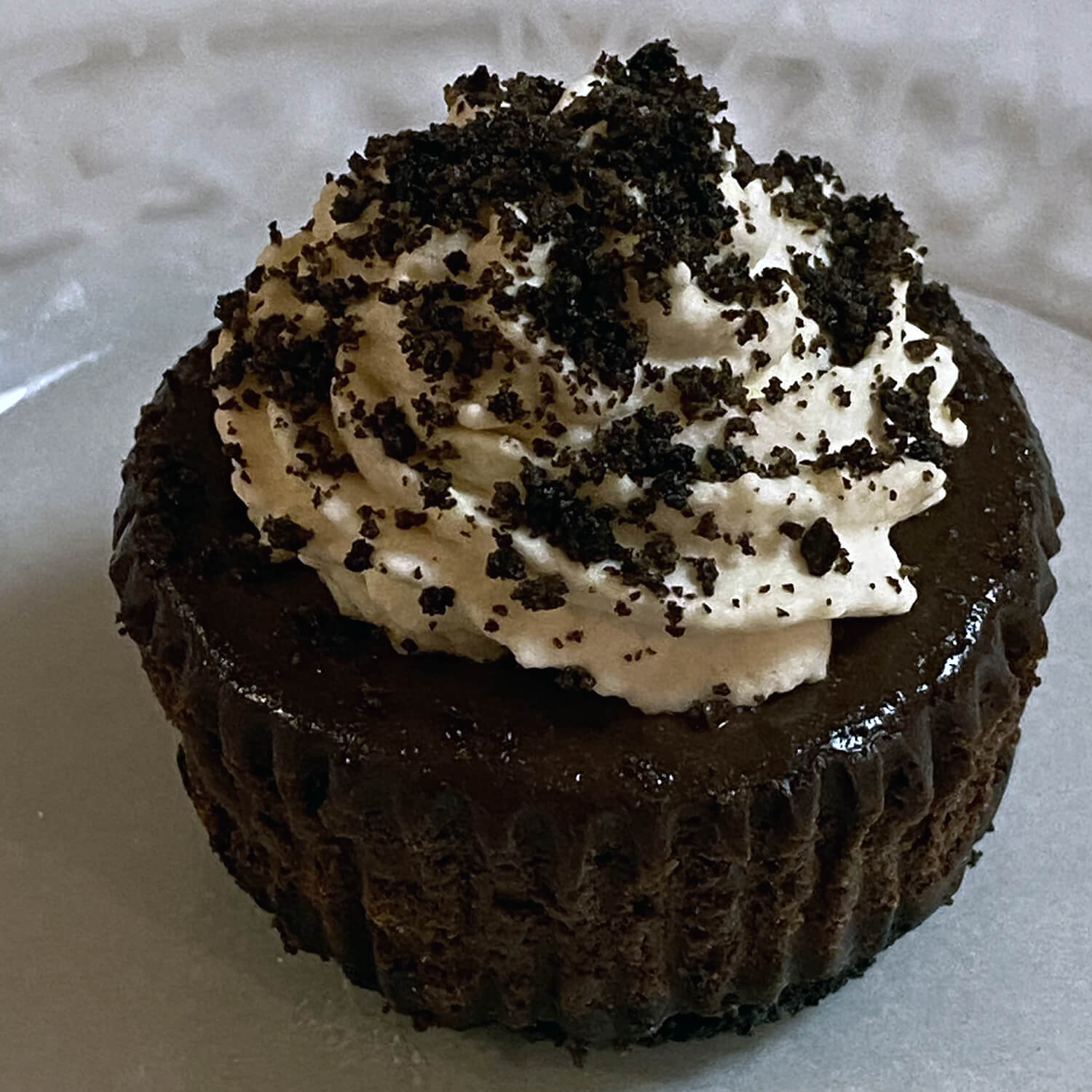 Knock Your Socks Off Baileys - It starts with an Oreo crust and is followed by a chocolate cheesecake that is flavored with Baileys Irish Cream. It is topped with Baileys whipped cream and Oreo cookie crumbs.