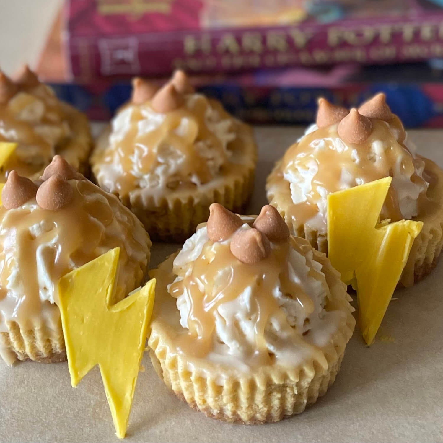 Butter Beer Butter Beer - Whether you are a fan of a certain boy wizard or you just like butterscotch, this cheesecake is for you. This Harry Potter inspired cheesecake starts with a graham cracker crust. The cheesecake layer combines the flavors of butterscotch and cream soda. It is topped with buttery whipped cream, homemade butterscotch sauce, and butterscotch chips.