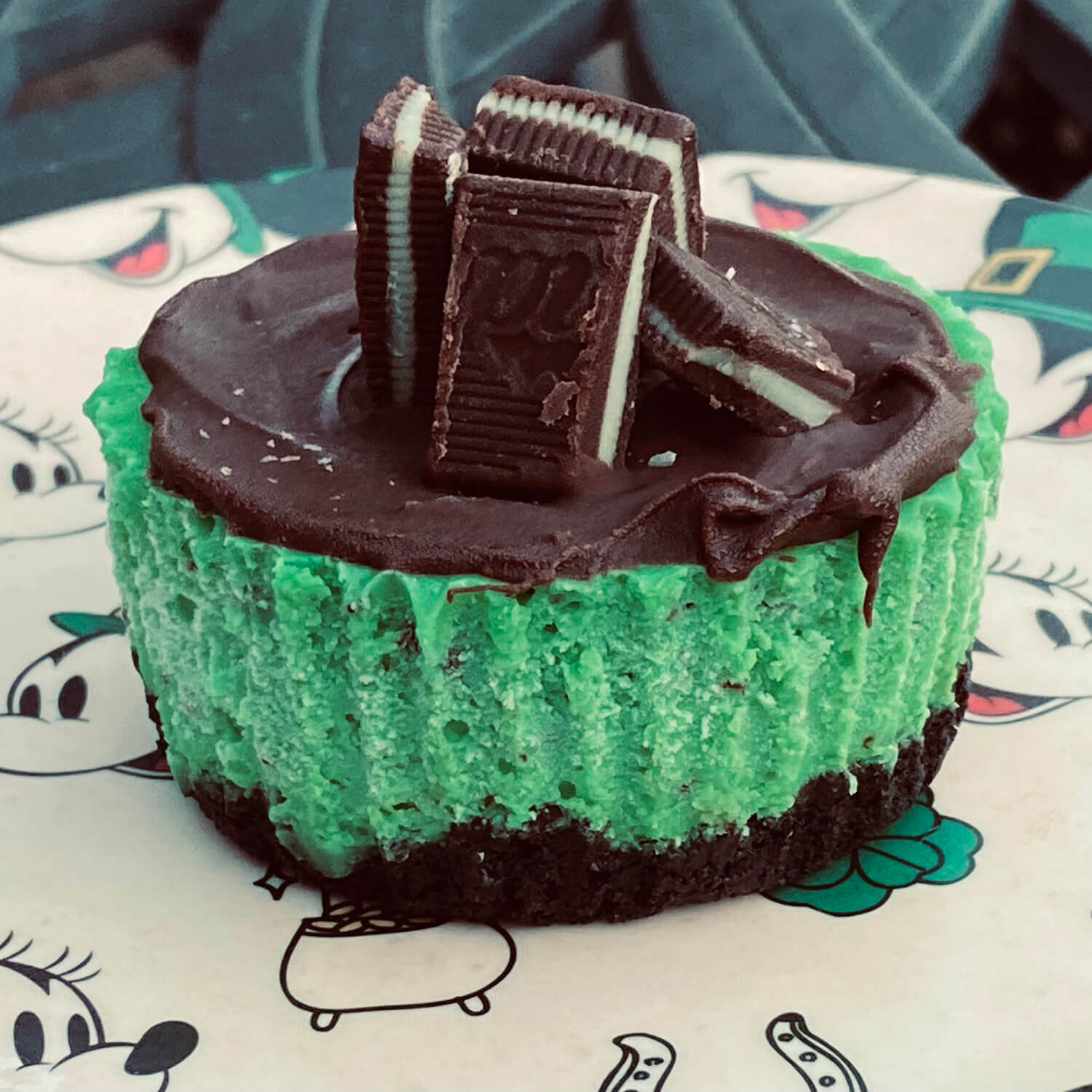 Mouthwatering Mint Mouthwatering Mint - In celebration of St. Patrick’s Day, we are bringing back one of our original flavors. This mouthwatering cheesecake starts with an Oreo crust. The minty cheesecake layer is loaded with pieces of Andes Mints. It is topped with a layer of chocolate and finished with what Maggie likes to call her modern art Andes mint sculpture.